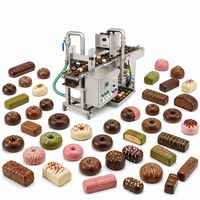 Ligne d'enrobage verticale mini pour chocolat de haute qualité, machine à enrober les bonbons avec petit tunnel de refroidissement pour l'enrobage au chocolat