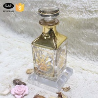 Flacon de parfum décoratif en cristal à motif de fleurs dorées de 150 ml