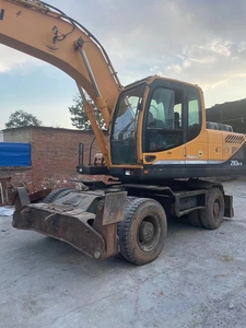 Excavatrice sur roues Hyundai R210W-9T d'occasion, 21 tonnes, d'origine coréenne, hydraulique, avec godet de 0,8 m³ pour travaux routiers, de construction et municipaux. - Product Image 5