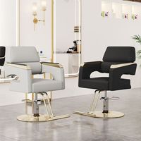 Fauteuil de barbier haut de gamme pour hommes en cuir synthétique avec accoudoirs en acier inoxydable noir, pivotant et relevable, provenant du mobilier de salon de coiffure