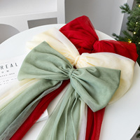Grand nœud en tulle rouge pour le sommet de l'arbre de Noël, idéal pour les vitrines et la décoration festive