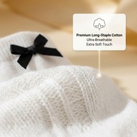 Chaussettes pour femmes mi-mollet en coton longue fibre, élégantes avec nœud, personnalisées OEM, pour l'hiver, antibactériennes, respirantes, antidérapantes, usage quotidien