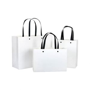 Sacs en papier kraft professionnels avec logo personnalisé, sacs shopping bruns avec dimensions 17cmx10cmx22cm, pack promotionnel - Product Image 1