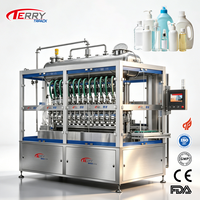 250ml 500ml 750ml 1000ml etc. Machine de remplissage automatique à débitmètre personnalisé haute précision pour bouteilles en plastique et en verre