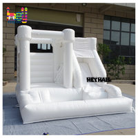 Château gonflable blanc commercial pour la location événementielle, idéal pour les mariages et les fêtes d'enfants