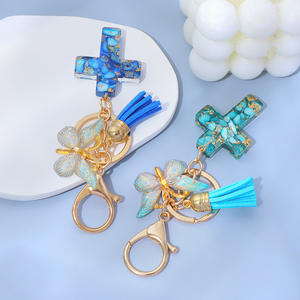 क्रिस्टियन प्यारा राल आकर्षण कीचेन फैशन तितली फ्रिंज क्रिस्टल ड्रॉप गोंद पत्थर क्रॉस टासल धातु कीचेन - Product Image 3