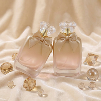 Flacon de parfum en verre élégant et luxueux de 55 ml avec capuchon en acrylique personnalisé et nœud décoratif – Vente en gros Anding