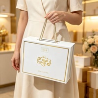 Boîte cadeau de luxe avec impression dorée à chaud, avec poignée, boîte à rabat personnalisée pour présentoir