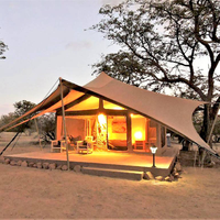 Tente de glamping de luxe pour safari africain, type villa, en acier, avec climatisation, grande couverture en toile PVC et côtés en tissu