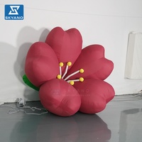 Installation artistique personnalisée de fleurs de kapok gonflables suspendues, modèle floral gonflable pour la décoration de scène et d'événements en extérieur