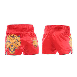 Vente en gros d'usine <span class=keywords><strong>de</strong></span> shorts <span class=keywords><strong>de</strong></span> muay-thaï tigre avec logo personnalisé pour hommes sublimation unie combat <span class=keywords><strong>de</strong></span> boxe brésil MMA grappling shorts - Product Image 1