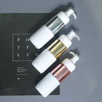 Bouteille en plastique PET argentée blanche personnalisée à double couche de 100 ml/120 ml/150 ml/50 g avec pompe à lotion et pot au design unique pour shampoing