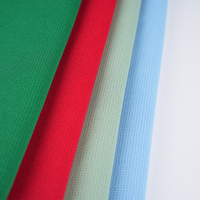 Tissu tricoté 100% polyester effet coton avec motifs colorés pour ensembles de vêtements de sport