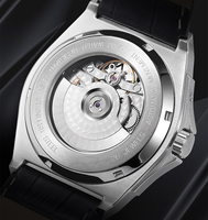 Montres mécaniques lumineuses en acier pour hommes, de style calendrier à roue volante, conçues et produites en usine en série, pour marque privée
