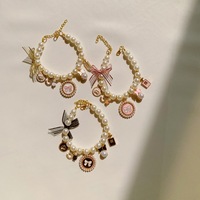 Collier pour animaux de compagnie en perles tendance avec clochette pour chats et petits chiens, accessoires élégants pour animaux de compagnie