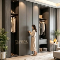 Armoire intégrée en bois composite personnalisable de teinte foncée, placard de chambre à coucher, poste de travail multifonctionnel pour l'étude