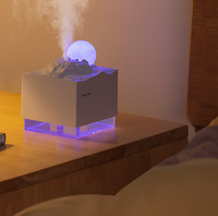 Humidificateur de bureau et veilleuse d'ambiance style Nouvelle Lune, compatible avec les huiles essentielles d'aromathérapie