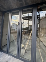 Porte d'entrée double battant en alliage d'aluminium et verre avec moustiquaire en fibre de verre et isolation thermique pour usage commercial, salle de bain, cuisine, école