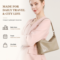 Sac à bandoulière Hobo en cuir véritable pour femmes avec fermeture éclair et sangle réglable pour les sorties quotidiennes Logo personnalisé OEM ODM