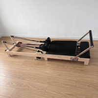 Reformer de Pilates pliable en bois de chêne, design classique Senrui, machine de luxe pour exercices de yoga, usage commercial, personnalisable pour le corps