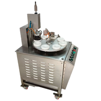 Machine pneumatique à tartelettes Machine automatique à presser la tarte aux œufs gaufrés pour faire la peau de la tarte aux œufs