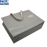 Créez un emballage pliable innovant et luxueux en papier cosmétique avec finition UV pour vêtements, huiles essentielles, parfums et cadeaux
