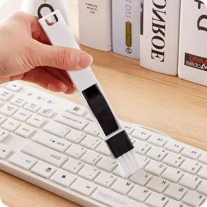 Brosse de nettoyage portable 2-en-1 multifonctionnelle pour portes, fenêtres et claviers, avec pelle à poussière et outil de nettoyage de rails – Vente en gros - Product Image 1