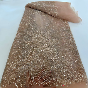 Tissu en dentelle de maille transparente dorée luxueuse, ornée de perles et de paillettes, pour la confection de vêtements de mariage nigériens pour femmes - Product Image 1