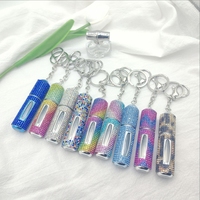 Le distributeur de parfum transfrontalier de 5ml peut être ajouté plusieurs fois clé de vaporisateur portable cloutée de diamants