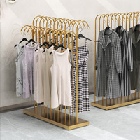 Étagère à vêtements de mode présentoir en métal au sol présentoir de t-shirt étagère à vêtements pour magasins de boutique