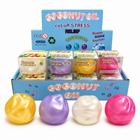 Balle anti-stress en TPR translucide et brillante, en forme de noix de coco, pour enfants, vente en gros