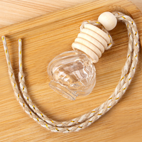 Bouteille suspendue vide de parfum de voiture en forme de boule de 9ML, diffuseur de désodorisant pour bouteille en verre d'huile essentielle de voiture, couvercle en bois