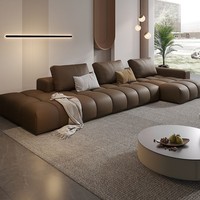 Canapé une place en cuir véritable à motif pixelisé de style italien, en cuir de vachette pleine fleur, palette crème, design moderne et minimaliste