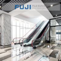 Escalator mécanique automatique FUJI, usage intensif pour centres commerciaux, avec un design contemporain