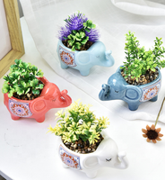 Pot de fleur en céramique émaillée en forme de petit éléphant mignon pour la maison et le jardin en gros