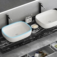 Meuble-lavabo de salle de bain à double vasque avec dessus en marbre noir imperméable de 60 pouces