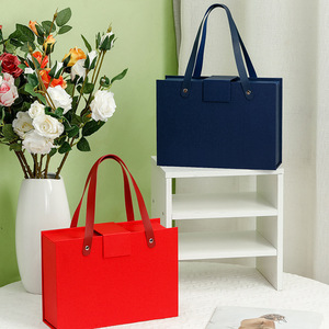 Luxury <b>Black</b> Collapsible Wig Hat Clothing Gift Box Folding Magnetic Closure with Ribbon Handle Custom Logo for Packaging - Product Image 1