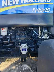 Tracteur d'occasion American Famous New Holland 1654 80HP avec jardinière de légumes - Product Image 5