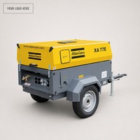 Compresseur d'air sur remorque Atlas Copco XA 77 E à essieu unique, avec capot à clapet et deux soupapes de sortie d'air en laiton
