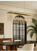 Luminaire suspendu contemporain en verre transparent avec cadre en laiton pour les espaces à plafond haut