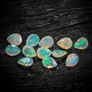 หินโอปอลแบบเอธิโอเปียนธรรมชาติคุณภาพสูงพลอยโอปอลไฟโอปอลแบบจุดไฟหลายจุดหินลูกแพร์หลวมสำหรับทำเครื่องประดับ - Product Image 1