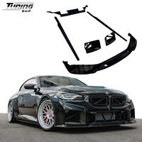 Kit carrosserie en fibre de carbone style R4 pour BMW M2 G87, comprenant lèvre avant, diffuseur arrière, jupes latérales et aération style AP - Vente chaude
