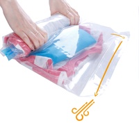 Sac de rangement sous vide en plastique de voyage à pressage manuel Sac d'économie d'espace sous vide enroulable