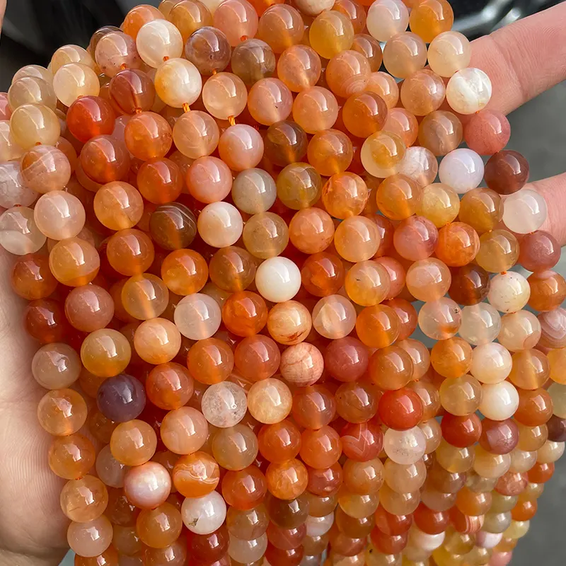 Commercio all'ingrosso naturale arancione persiano Guff agata gemma 6-10mm rotondo liscio naturale rosso Botswana agata perline per la creazione di gioielli