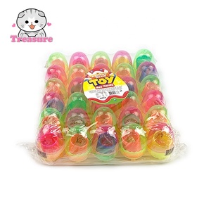Caramelos al por mayor etiqueta privada personalizada juguete interesante huevo caramelo colorido caramelo duro y bobina de resorte juguete para niños delicioso juguete caramelo - Product Image 1