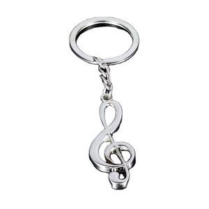 Breloque <span class=keywords><strong>de</strong></span> sac unique avec symboles musicaux, collection Club, cadeaux, porte-clés guitare et note <span class=keywords><strong>de</strong></span> <span class=keywords><strong>musique</strong></span>, instrument <span class=keywords><strong>de</strong></span> <span class=keywords><strong>musique</strong></span> élégant pour <span class=keywords><strong>les</strong></span> fans - Product Image 1