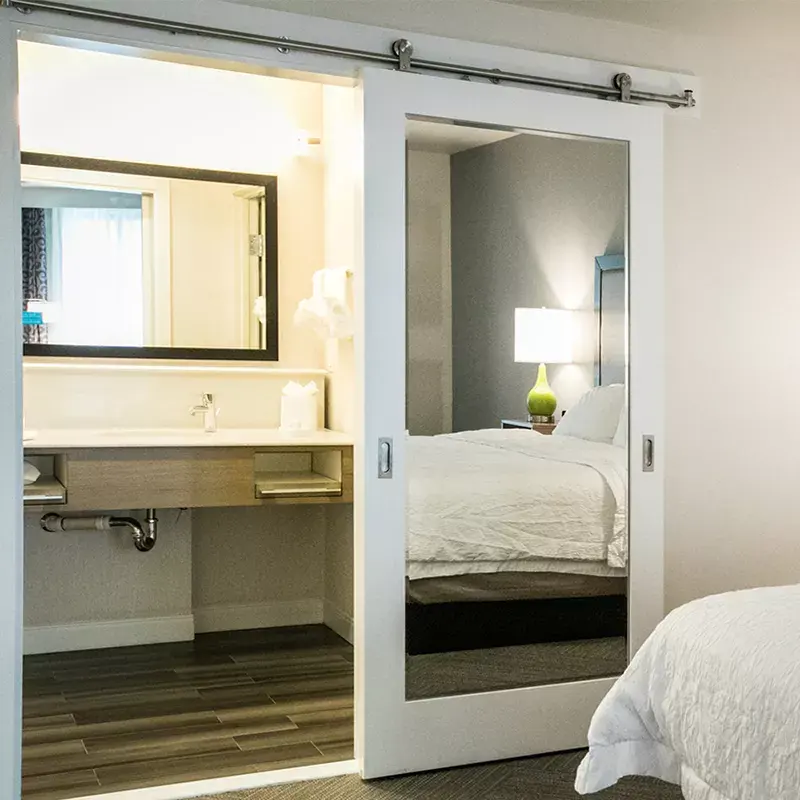 Hampton inn Marriott Spring hill Suites hotel Interior Sliding bathroom Barn Doors with hardware kit