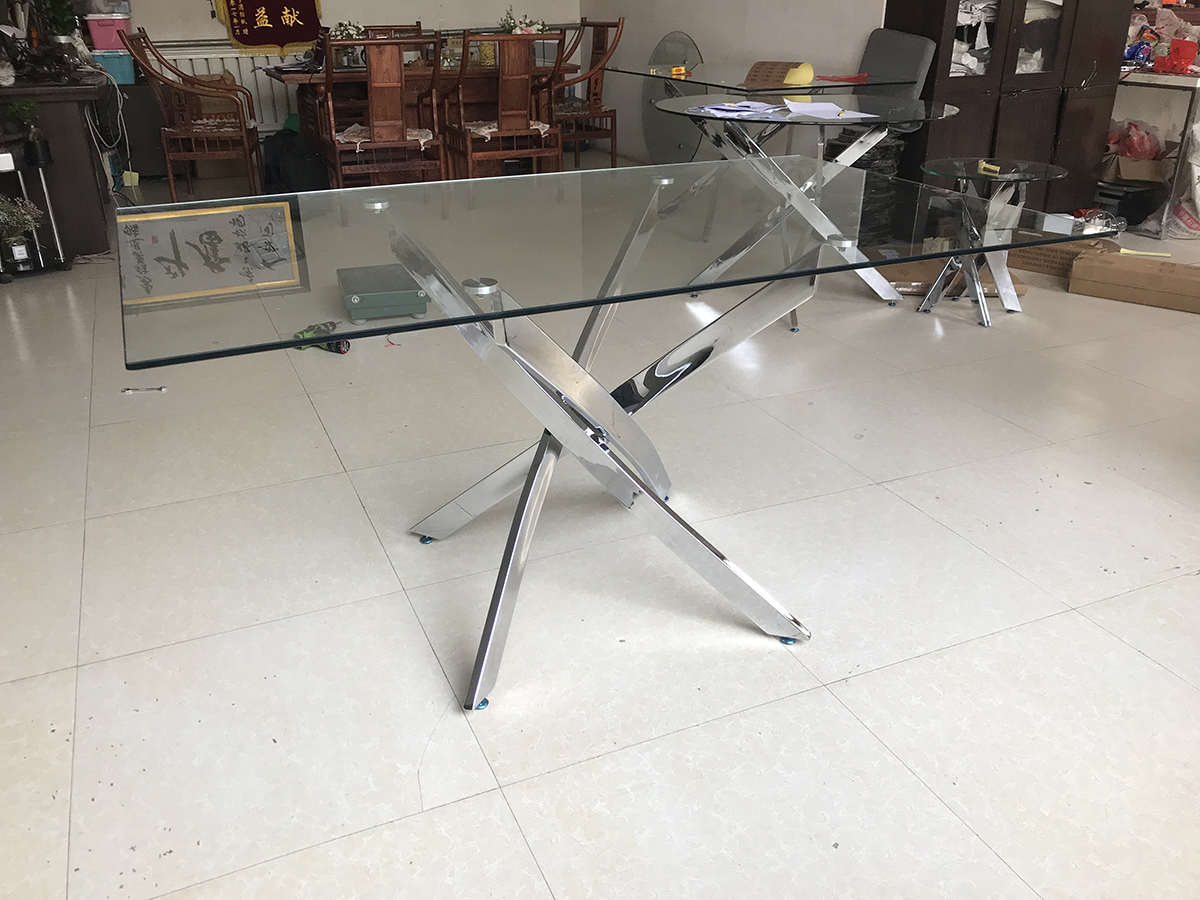 משלוח מדגם סיטונאי OEM/ODM מודרני עיצוב בית ריהוט חדר אוכל שולחן סטי מתכת נירוסטה זכוכית אוכל שולחן