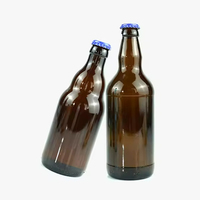 Bouteilles de bière en verre ambré de haute qualité avec bouchon et impression sérigraphique 350ml/530ml/750ml pour l'eau/les jus/les boissons