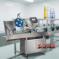 Machine d'étiquetage horizontale entièrement automatique Solidpack pour flacons et tubes de 10 ml et 20 ml, pour l'étiquetage des ampoules et des fioles